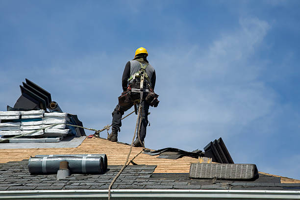 Professional Gutter Installation technician working in Parker, KS